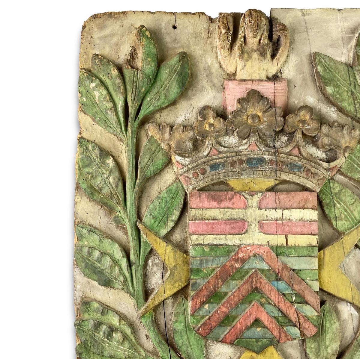 Polychromed oak armorial panel. French, 18th century