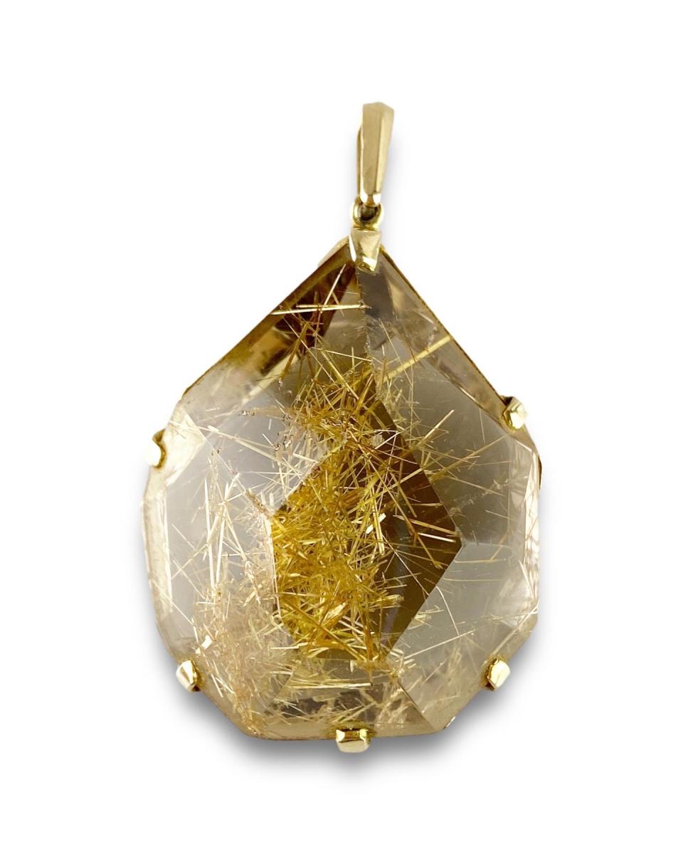 Faceted rutilated quartz pendant. English, 1970’s
