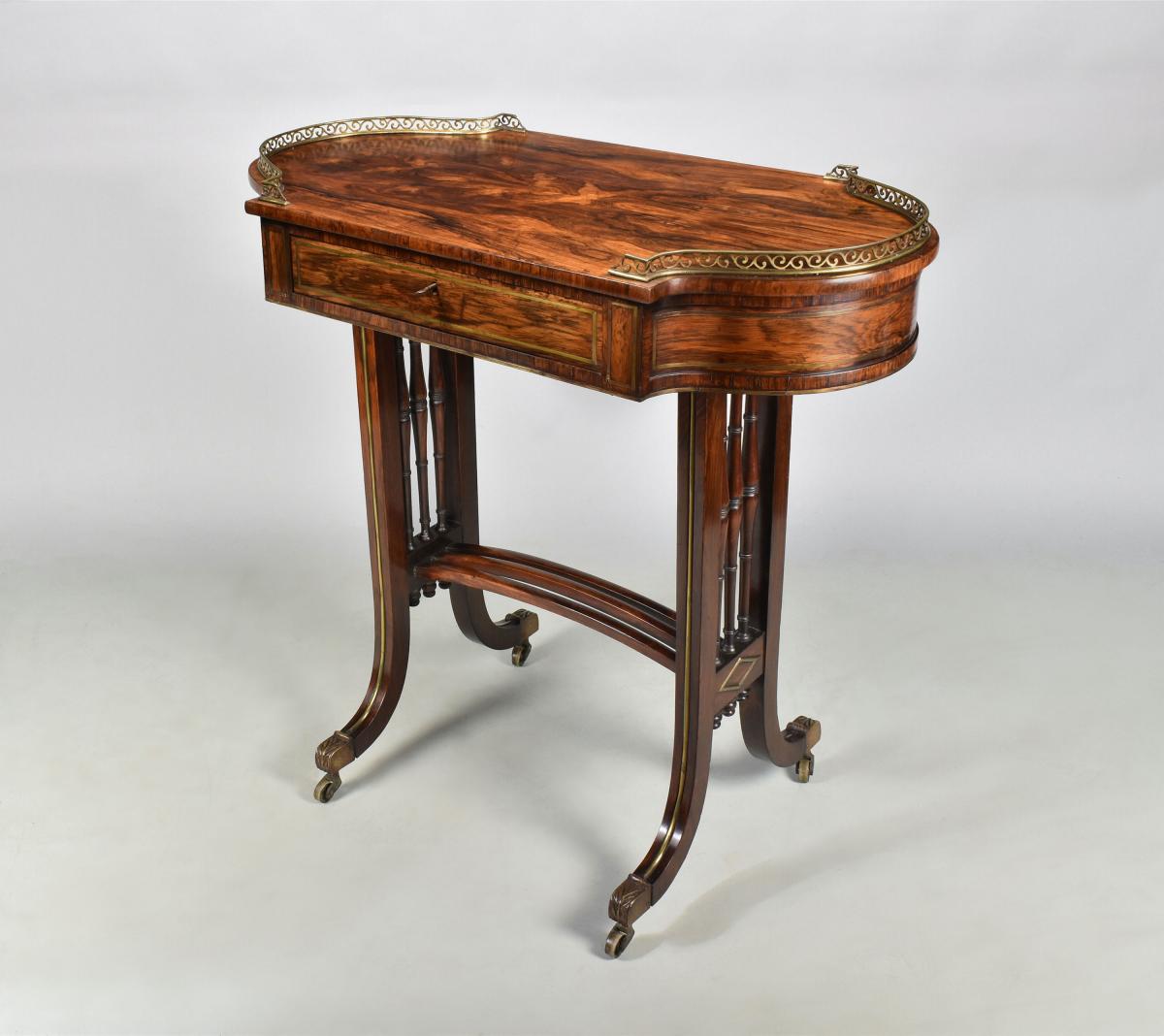A fine Regency brass inlaid rosewood occasional table, almost certainly by Gillow, c.1810