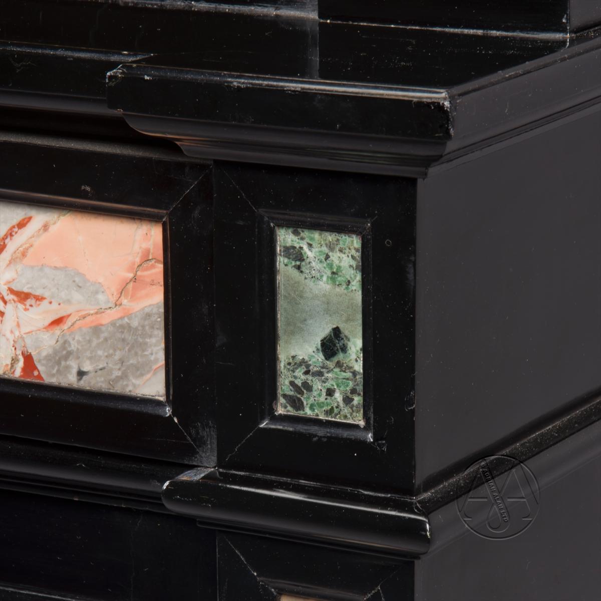 A Detail from a Pair of Napoleon III Ebony and Pietre Dure Bookcases
