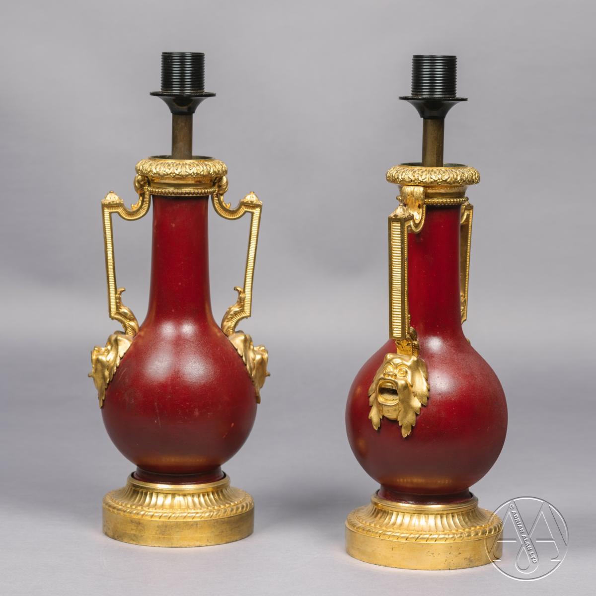 A Pair of Gilt-Bronze Mounted Red Lacquer Vases Adapted as Table Lamps