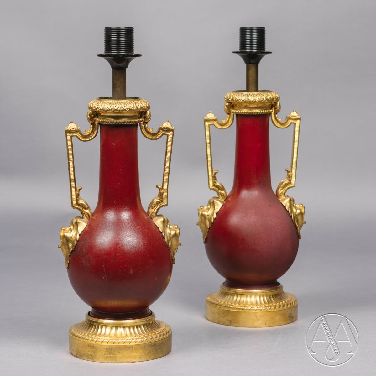 A Pair of Gilt-Bronze Mounted Red Lacquer Vases Adapted as Table Lamps