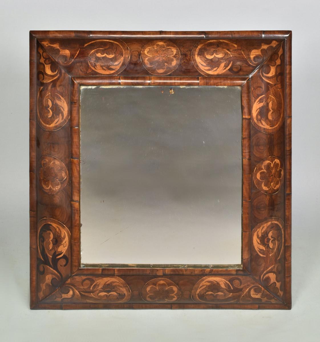 William and Mary marquetry oyster walnut cushion mirror, c.1690