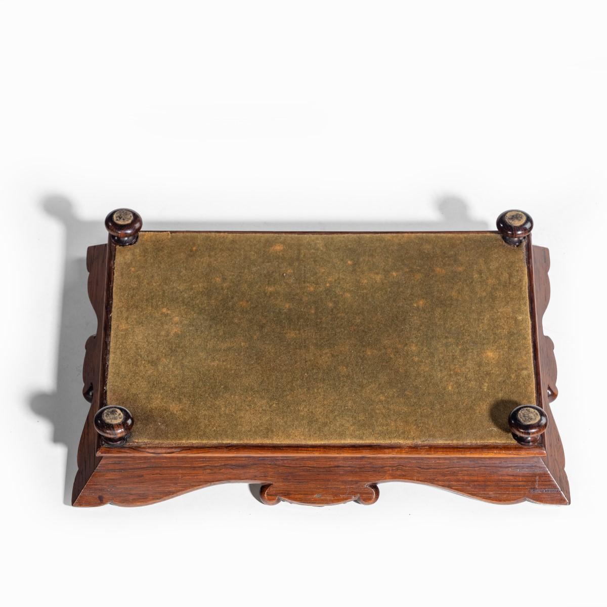 A William IV rosewood desk tidy attributed to Gillows