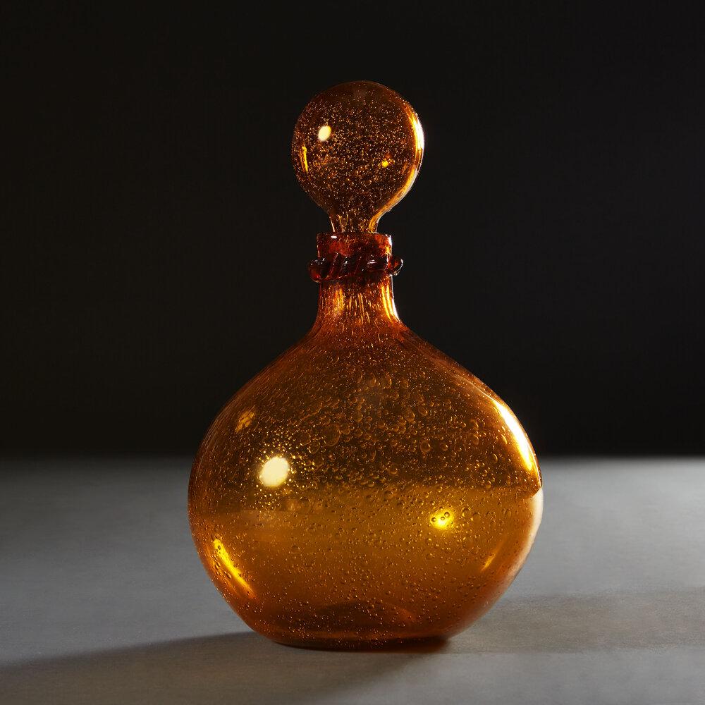 A Rare Overscale Amber Glass Vessel With Stopper