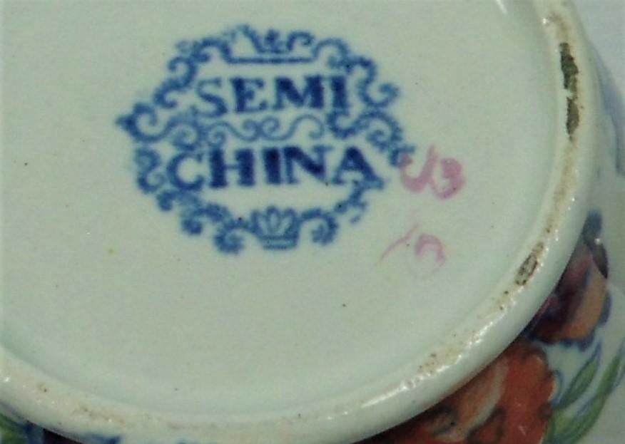 A small hand coloured Semi China jug, English c.1820