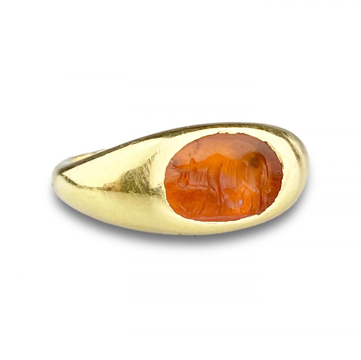 Roman carnelian ring with intaglio of a Cow and calf. 1st-2nd century AD