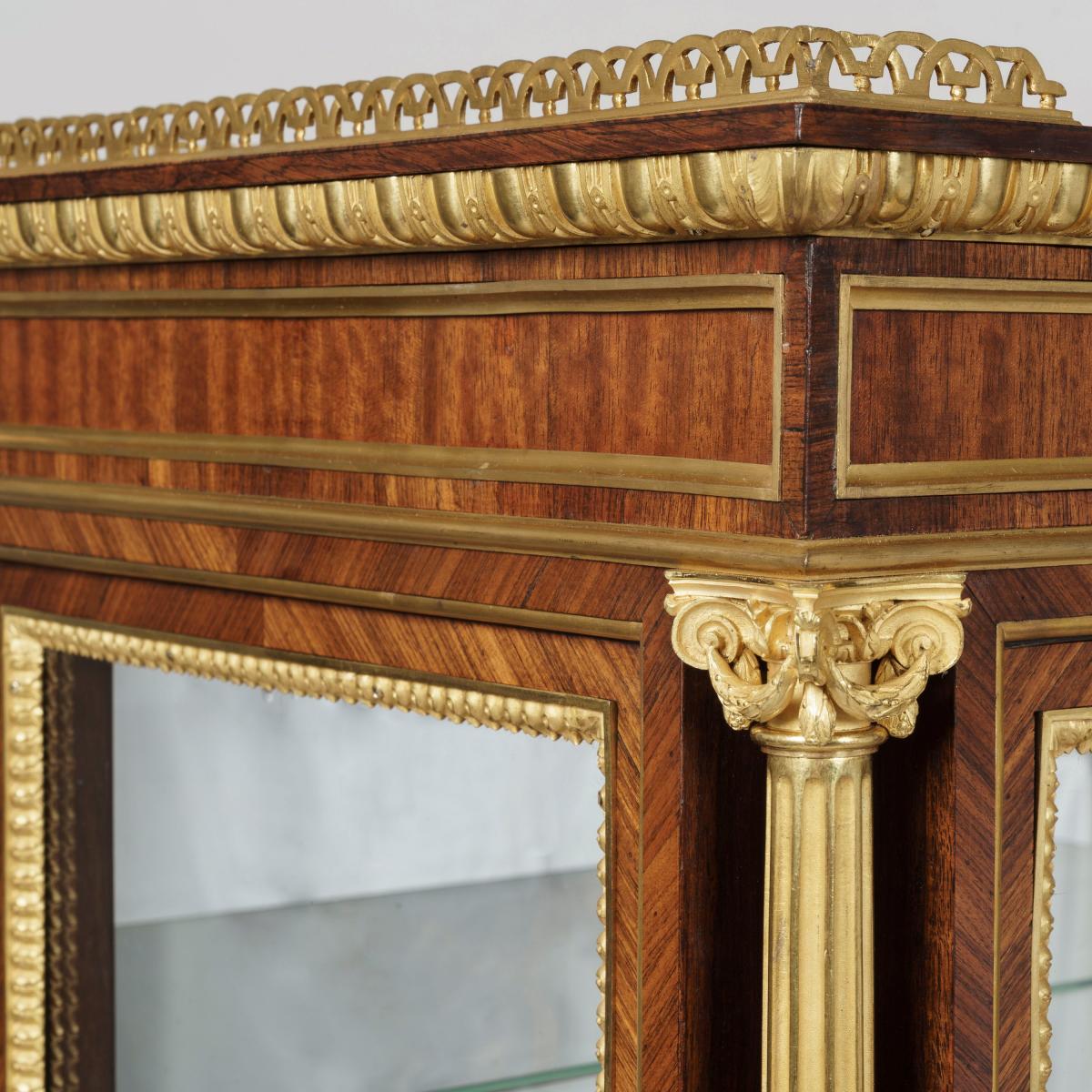 A Pair of Display Cabinets in the Louis XVI Manner