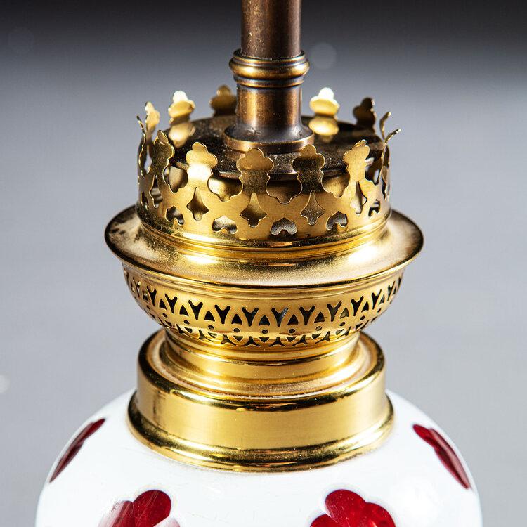 A Gothic Red and White Glass Lamp with Brass Base