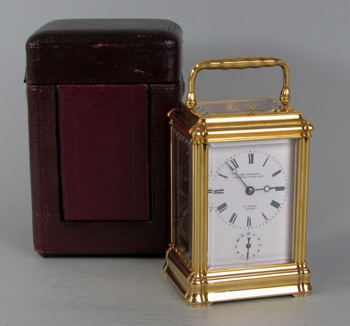 A gorge carriage clock by Henri Jacot & Alfred Baveux for Charles Frodsham travelling box