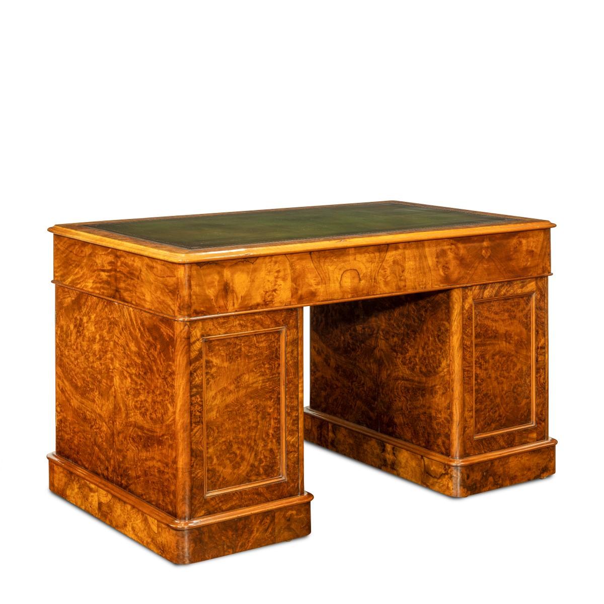 A Victorian burr walnut free standing pedestal desk by Druce & Co