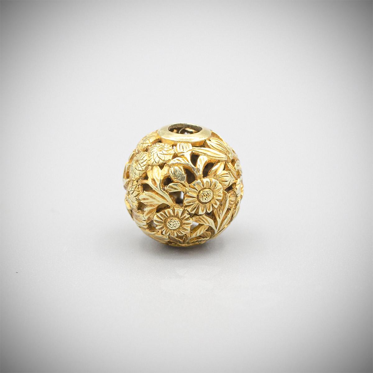 Carved Gold Ojime with Chrysanthemums