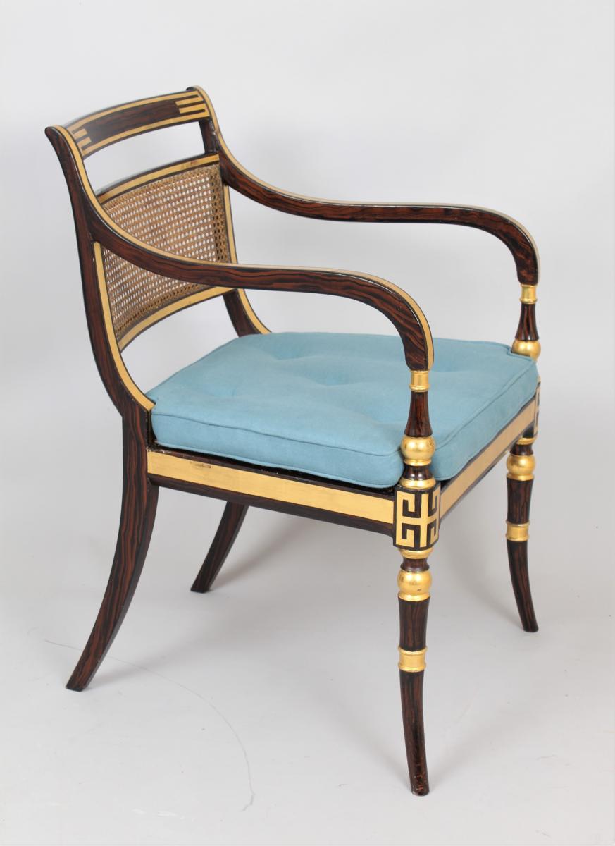 Early 19th century decorated open arm chair