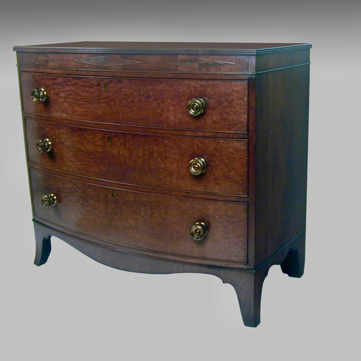 antique Regency mahogany bow front chest of drawers