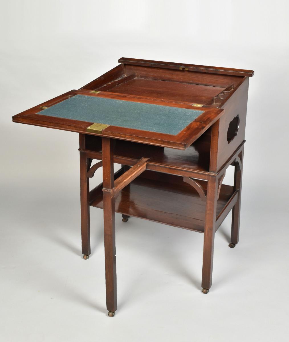 An unusual George II period mahogany writing table with adjustable top, c.1750