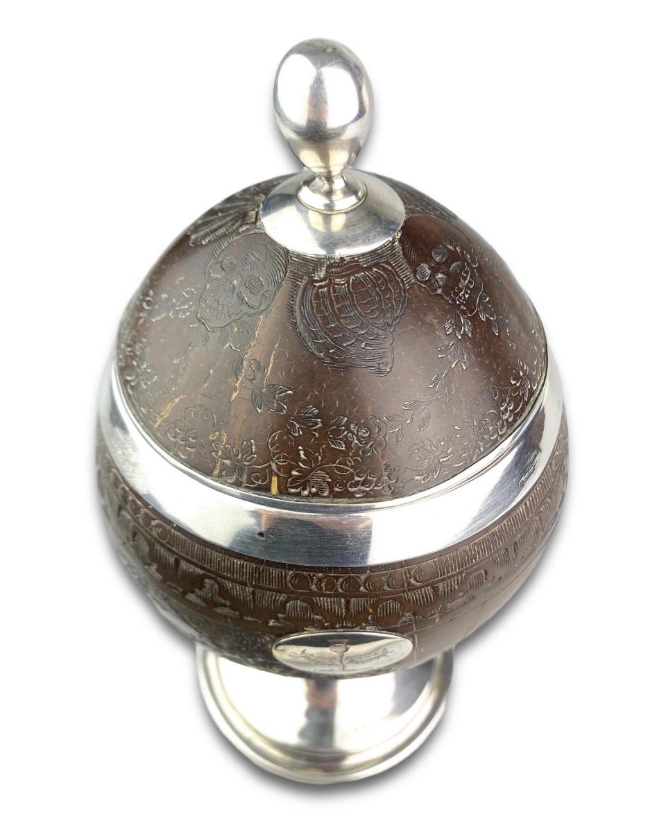 Silver mounted engraved coconut cup. English, early 19th century