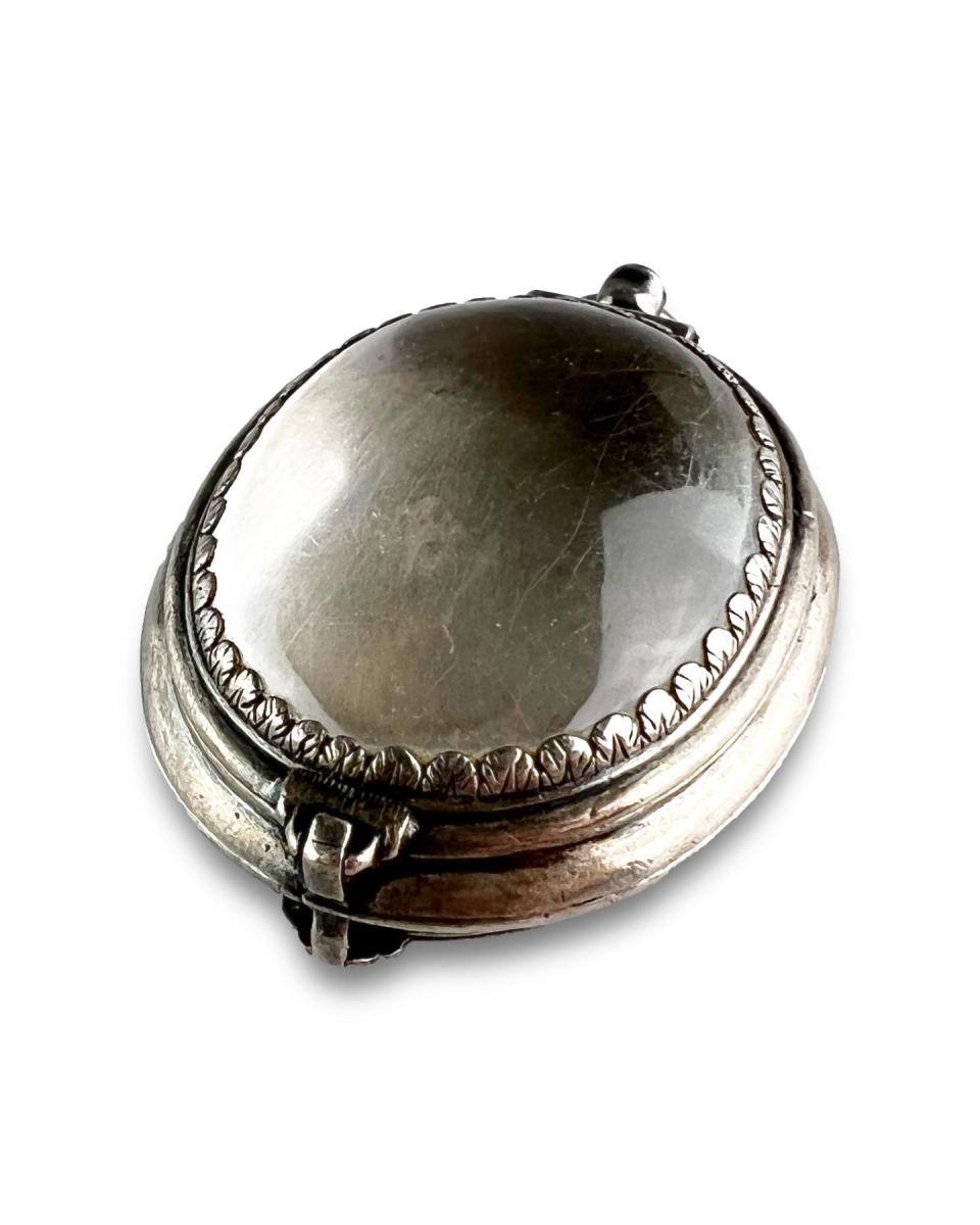 Double sided silver and rock crystal locket pendant. French, late 17th century