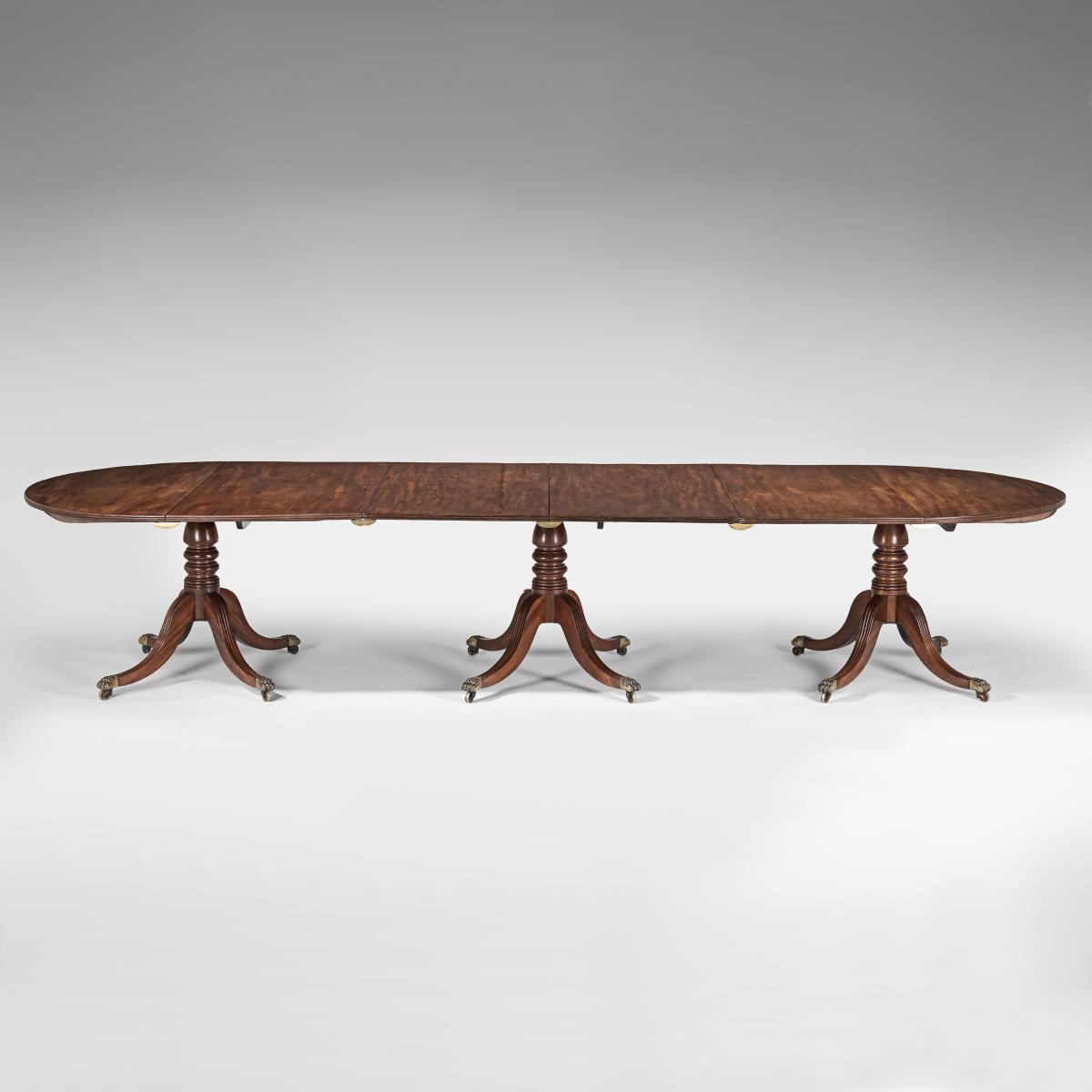 George III mahogany three pillar dining table
