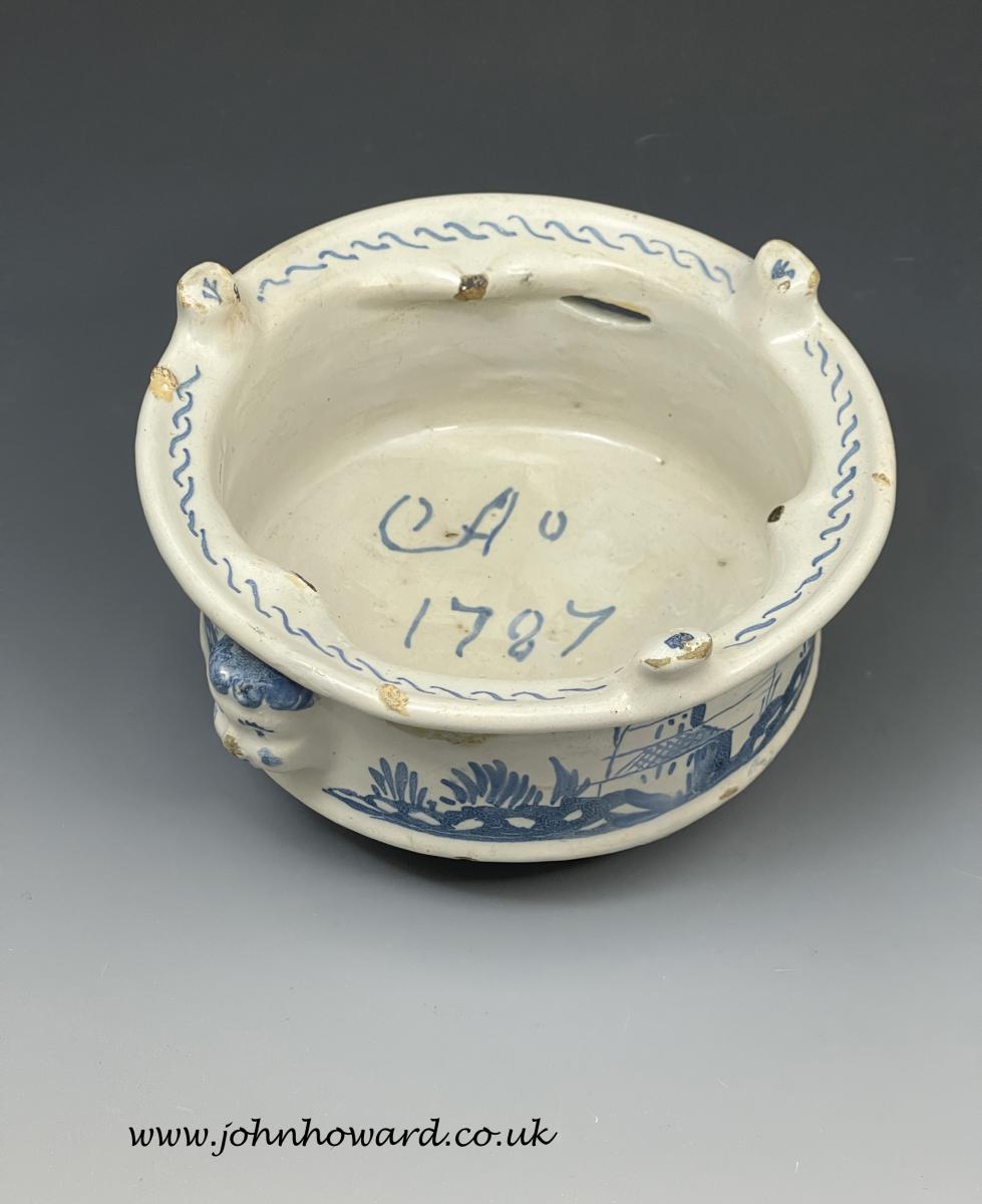 Delftware pottery blue and white food or plate warmer dated 1787