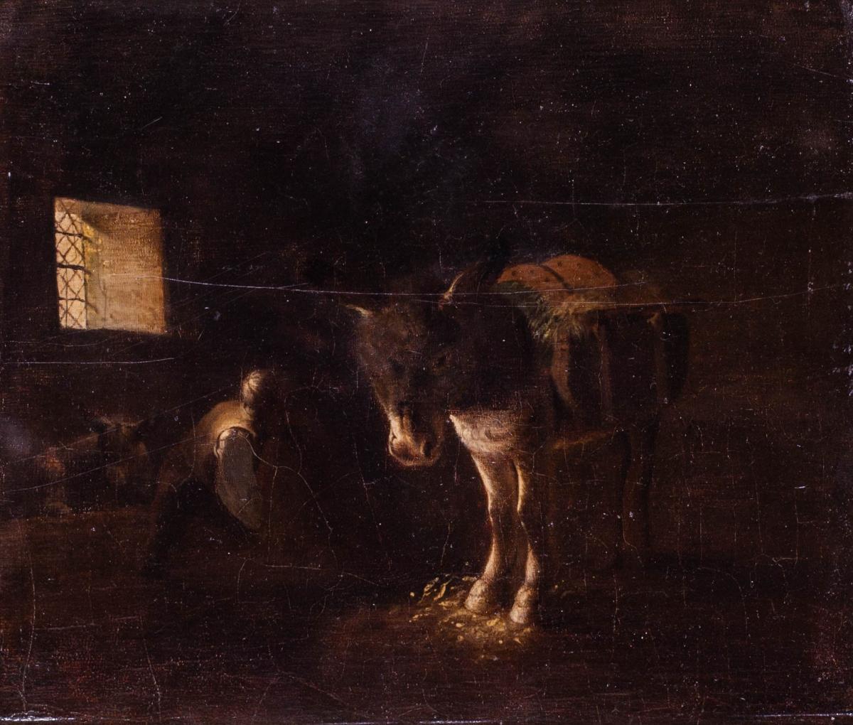 Dutch School, 18th Century, A farmhand tending to donkeys in a stable