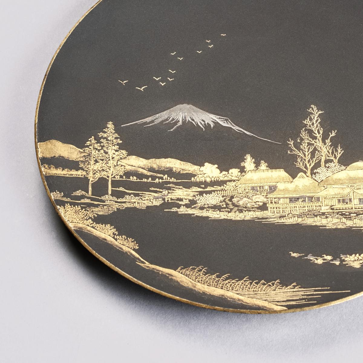 Japanese iron dish decorated with Mount Fuji