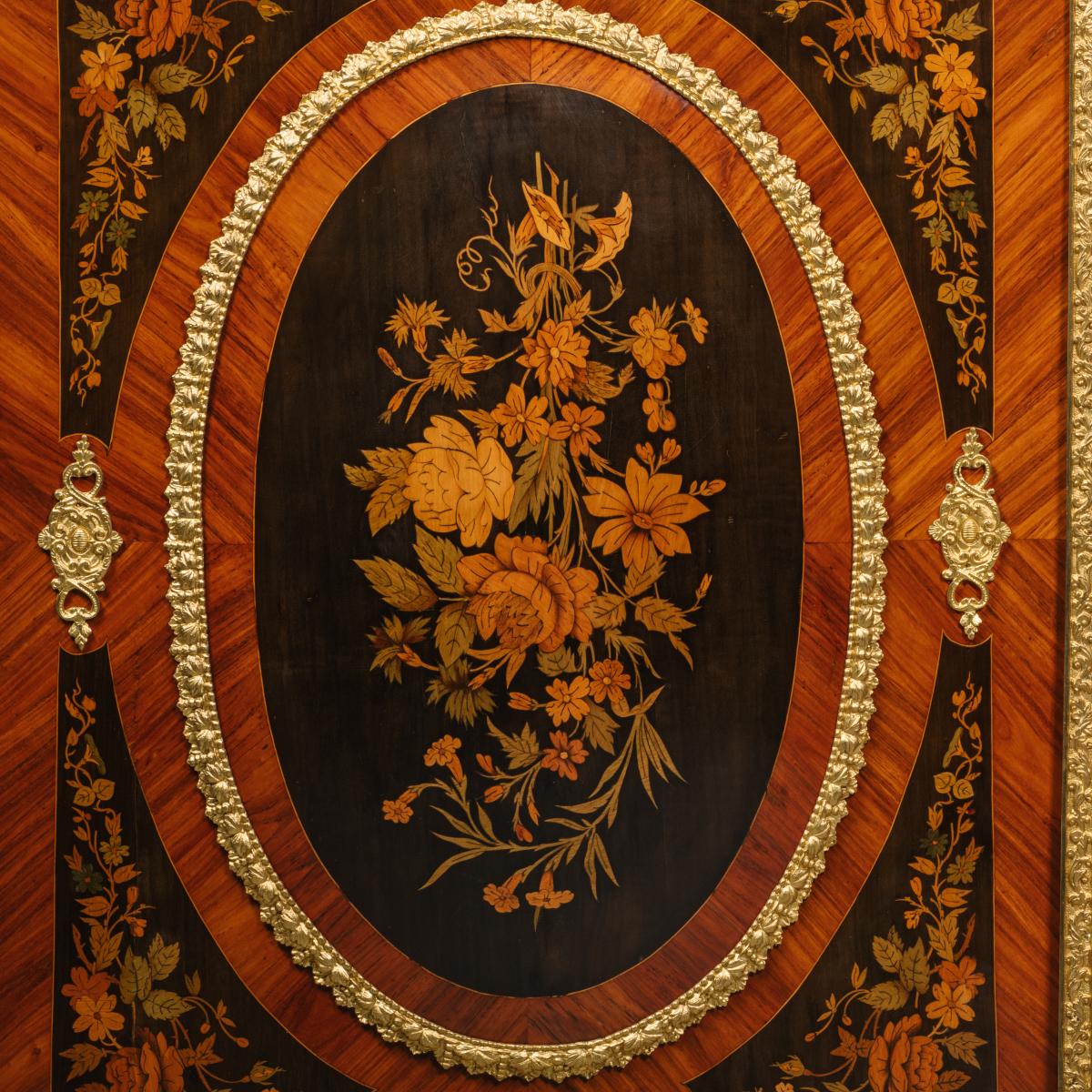 A Detail From A Pair of Napoleon III Ormolu-Mounted Marquetry Side Cabinets 