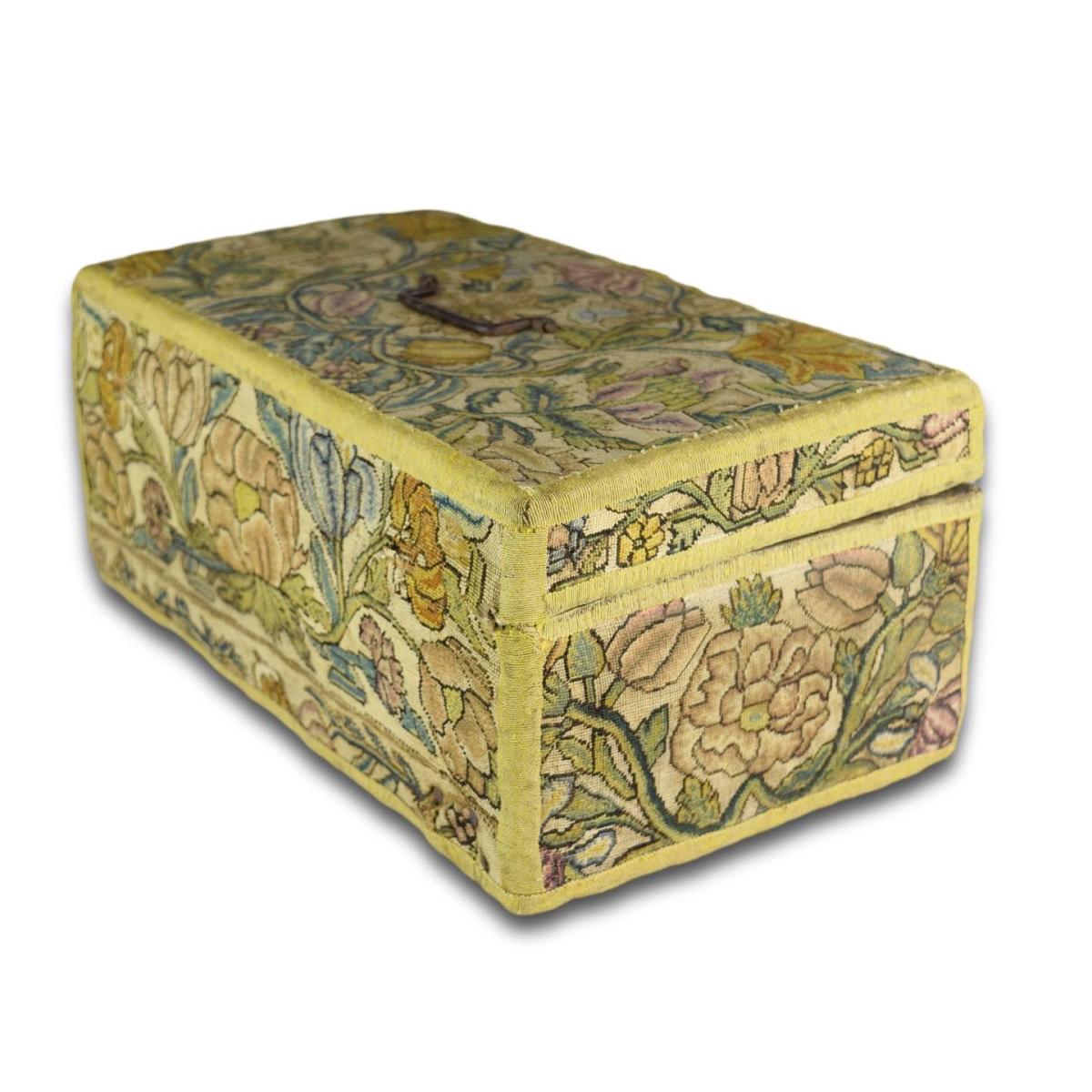Fine needlework casket decorated with exotic flowers. French, 17th century
