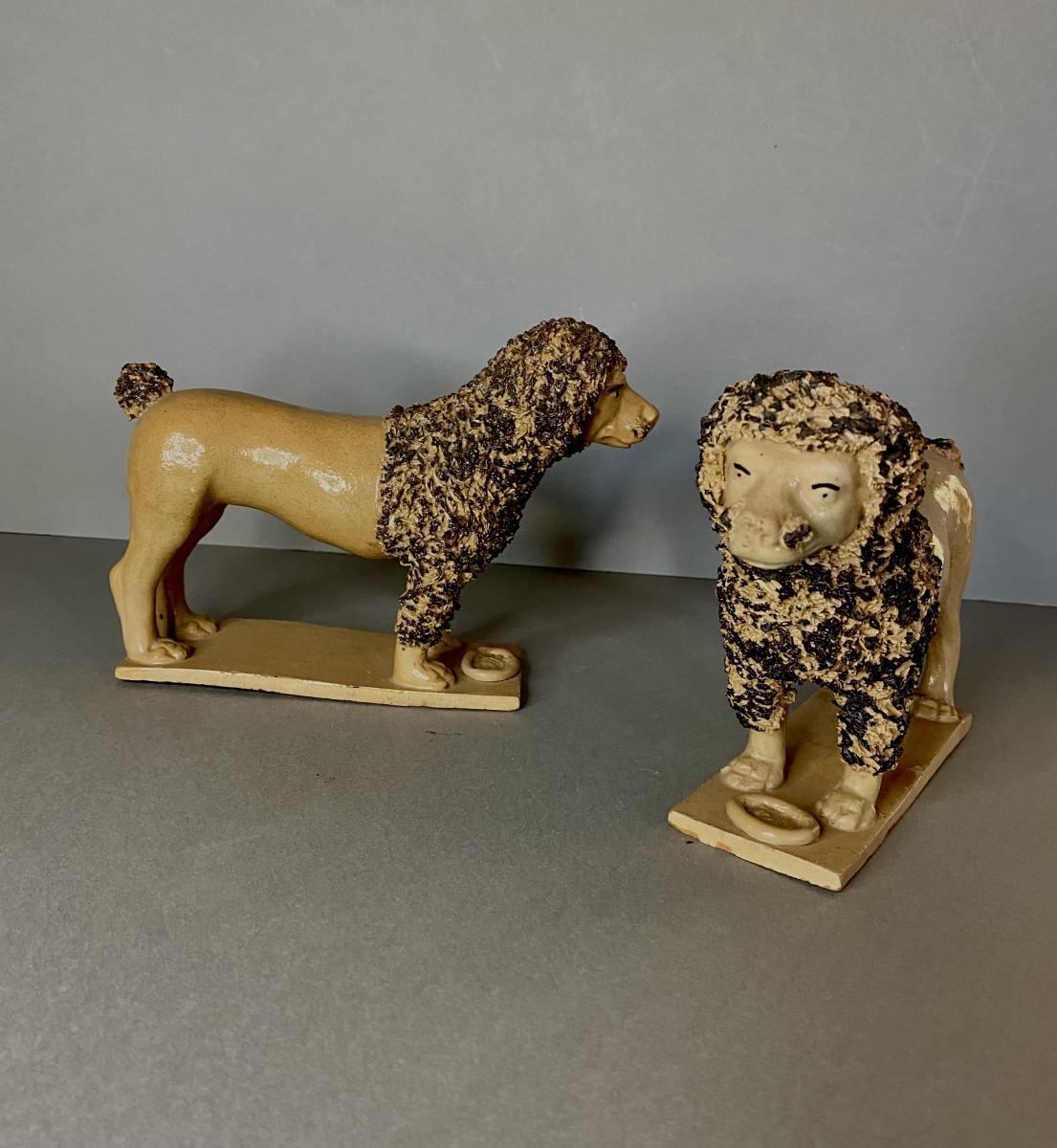 Wonderful early C19th Pair of Staffordshire pottery Poodles