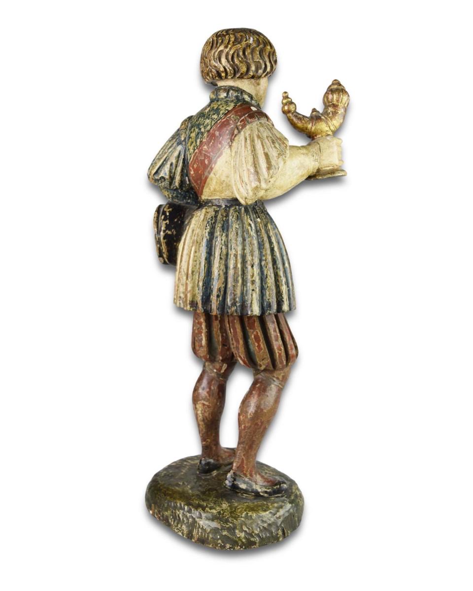 Polychromed wooden sculpture of a King. French, around c.1500