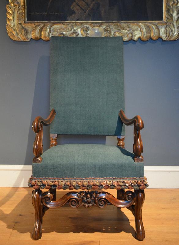 A William III walnut armchair Circa 1700