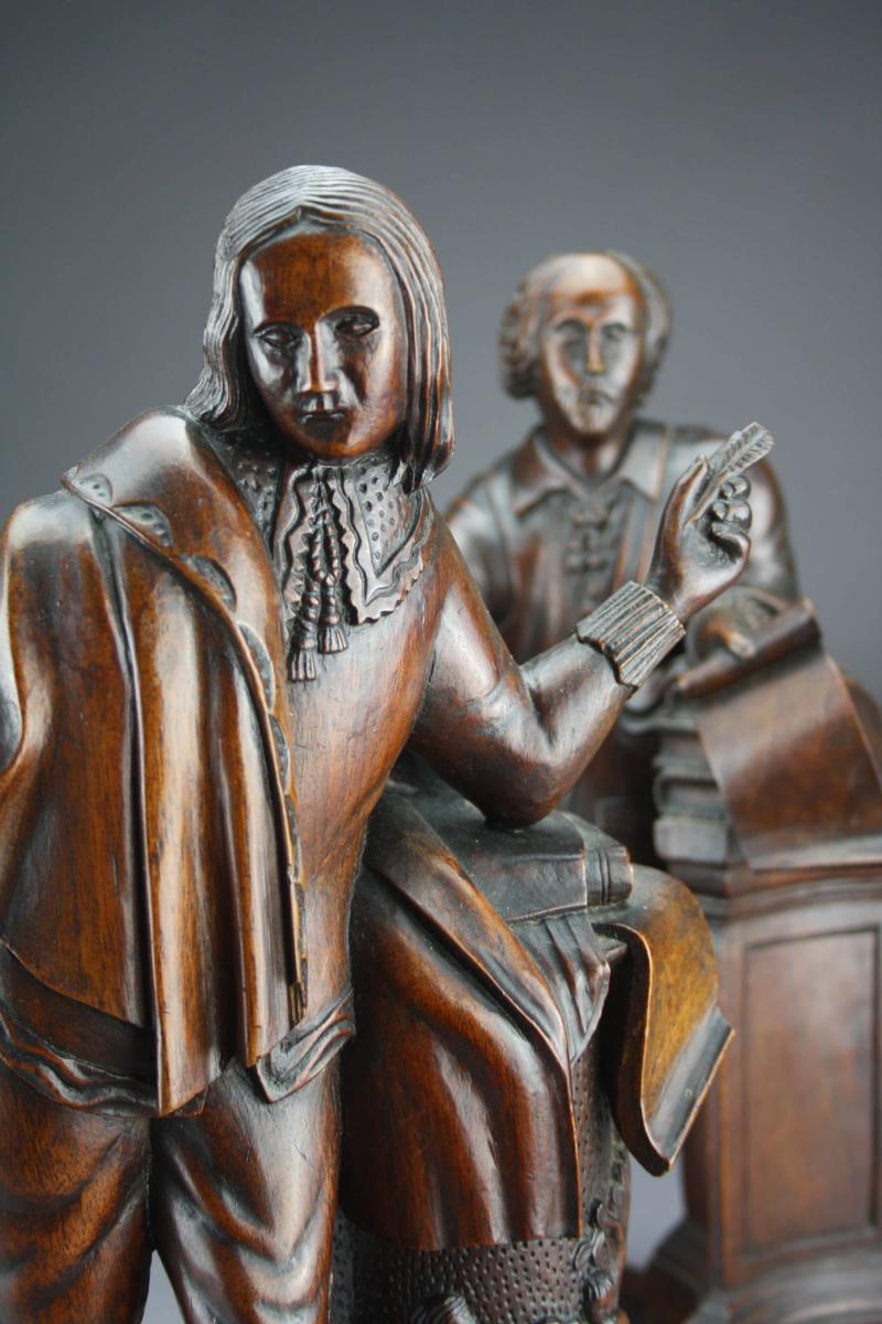 English carved walnut figures of Shakespeare and Milton