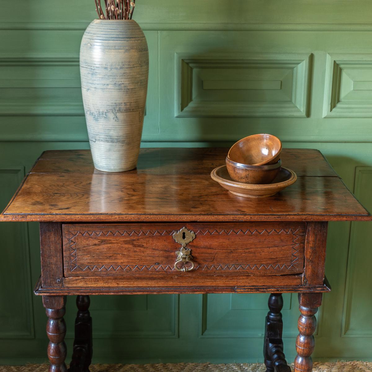 An unusual Charles II joined elm and oak side table, circa 1680