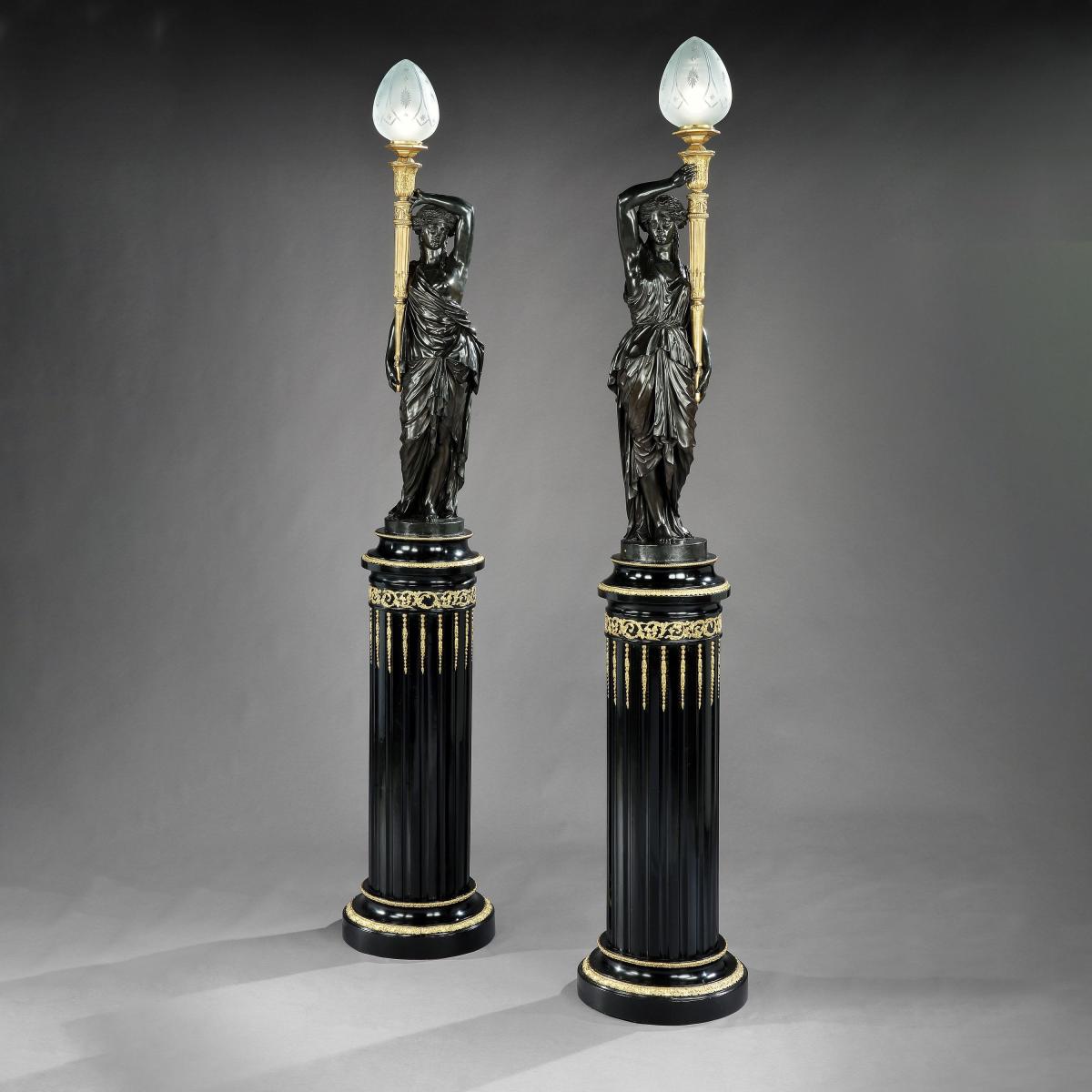 A Magnificent Pair of Figural Torchères by Henry Dasson