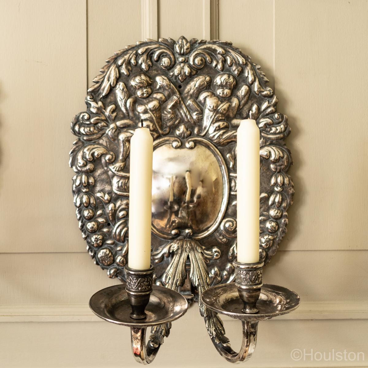 A good pair of silver-metal cast candle wall sconces, in the Charles II circa 1670 manner, circa 1890