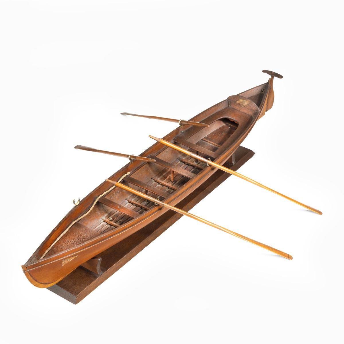 An Edwardian pine five-oar rowing skiff