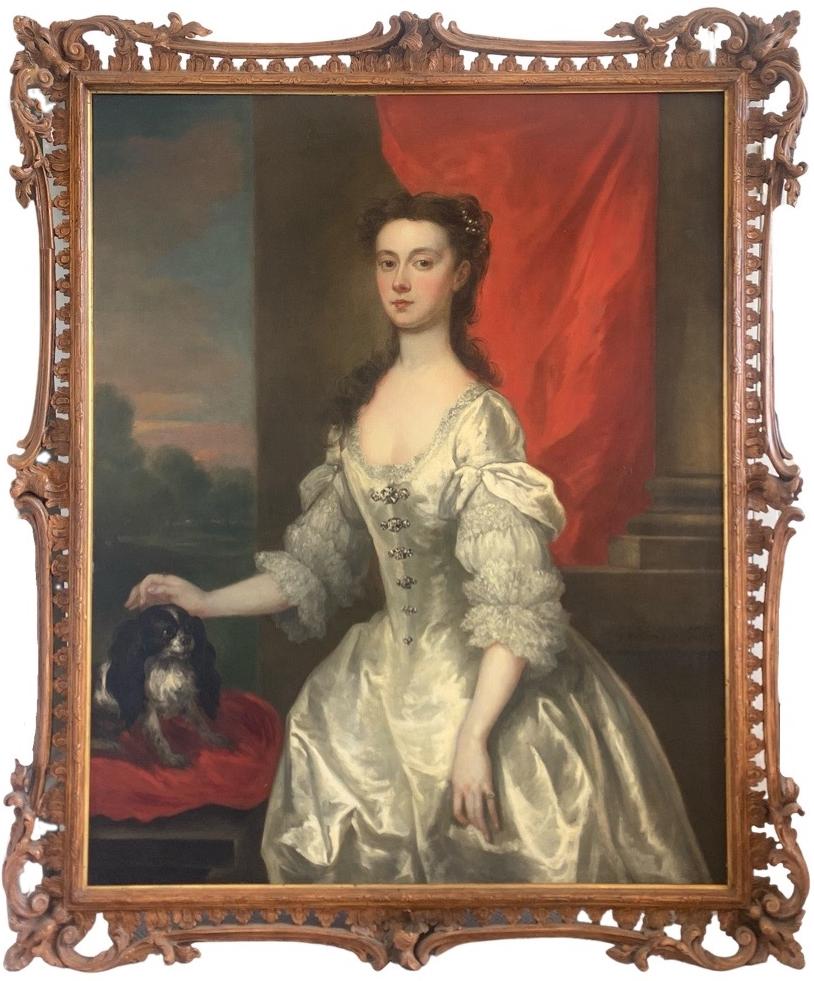 Portrait of a lady with a spaniel by John Vanderbank