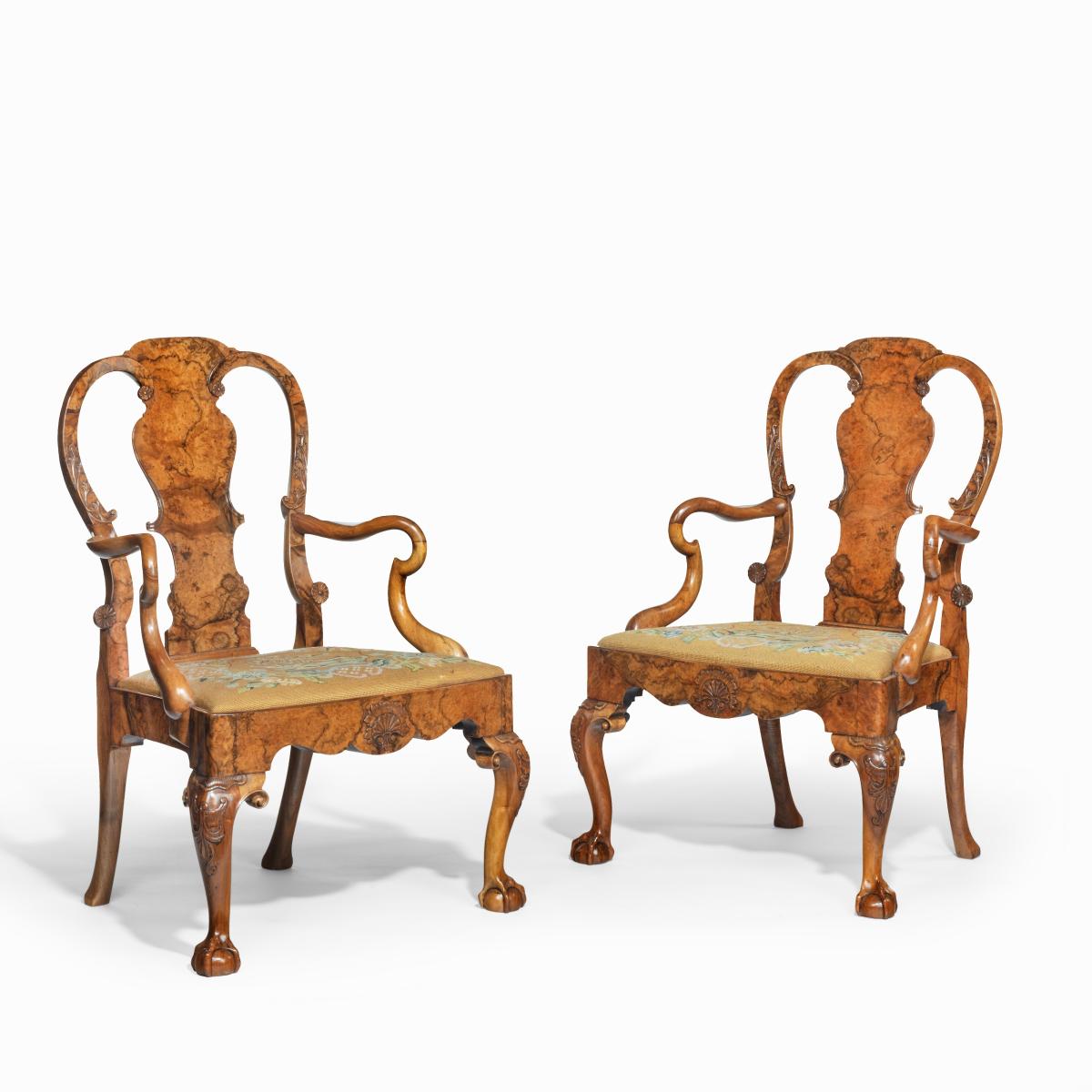George II style walnut open arm chairs