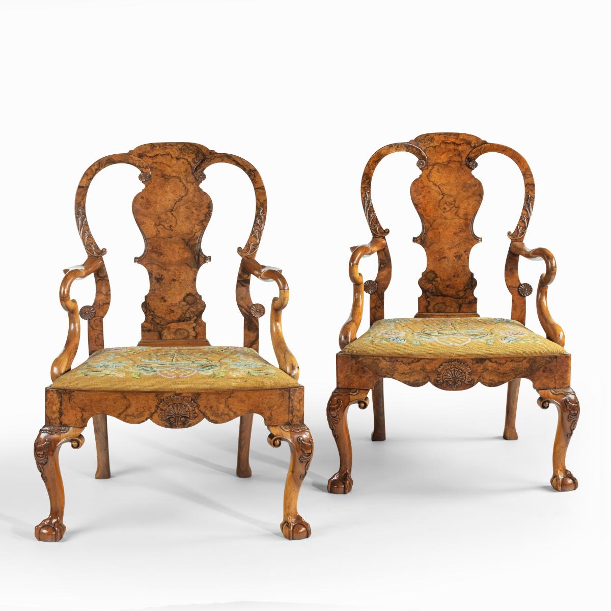 George II style walnut open arm chairs