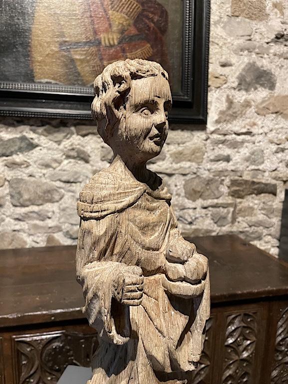 A WONDERFUL AND RARE ENGLISH MEDIEVAL OAK SCULPTURE OF A MONK. CIRCA 1450.