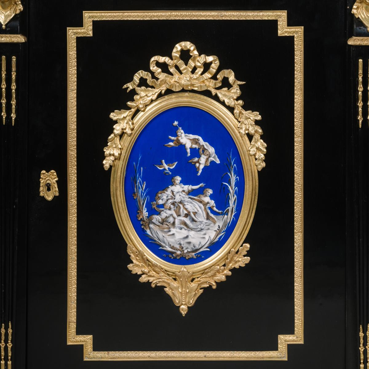 Napoleon III Gilt-Bronze And Porcelain-Mounted Ebonised Cabinets