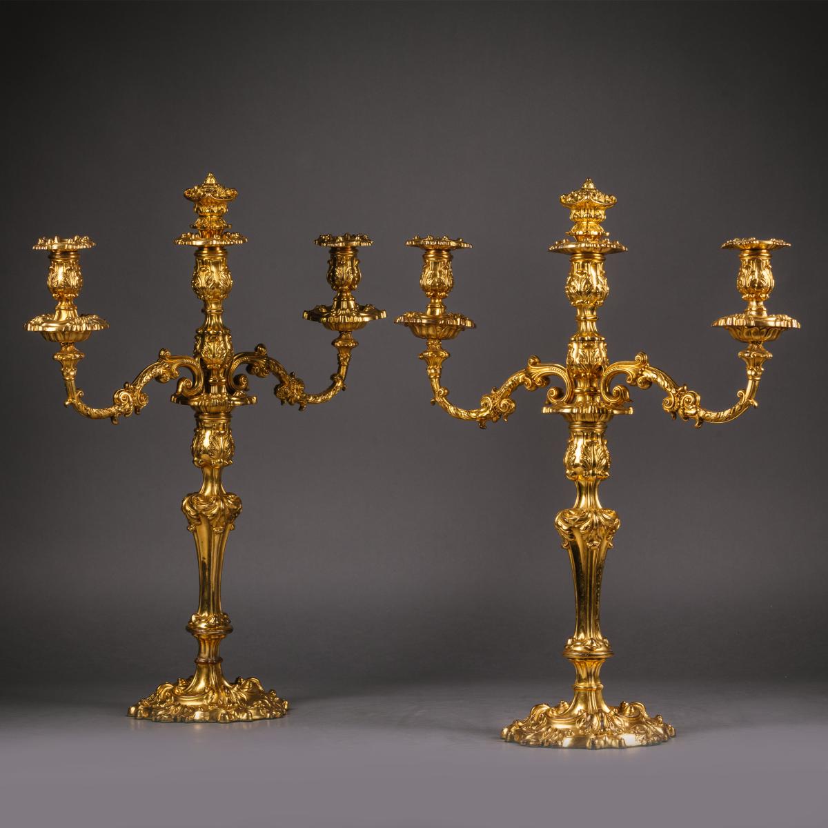 A Pair of Louis XV Style Rococo Revival Ormolu Three-Light Candelabra.  English, Circa 1860.