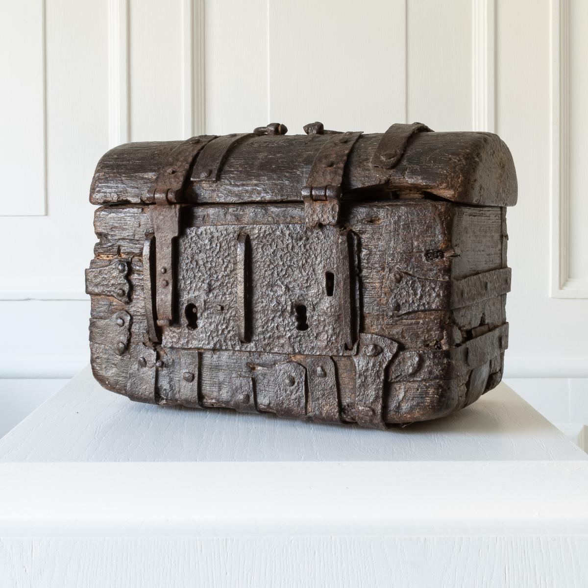 An exceptionally rare Medieval oak and iron-bound casket, English, circa 1350-1450