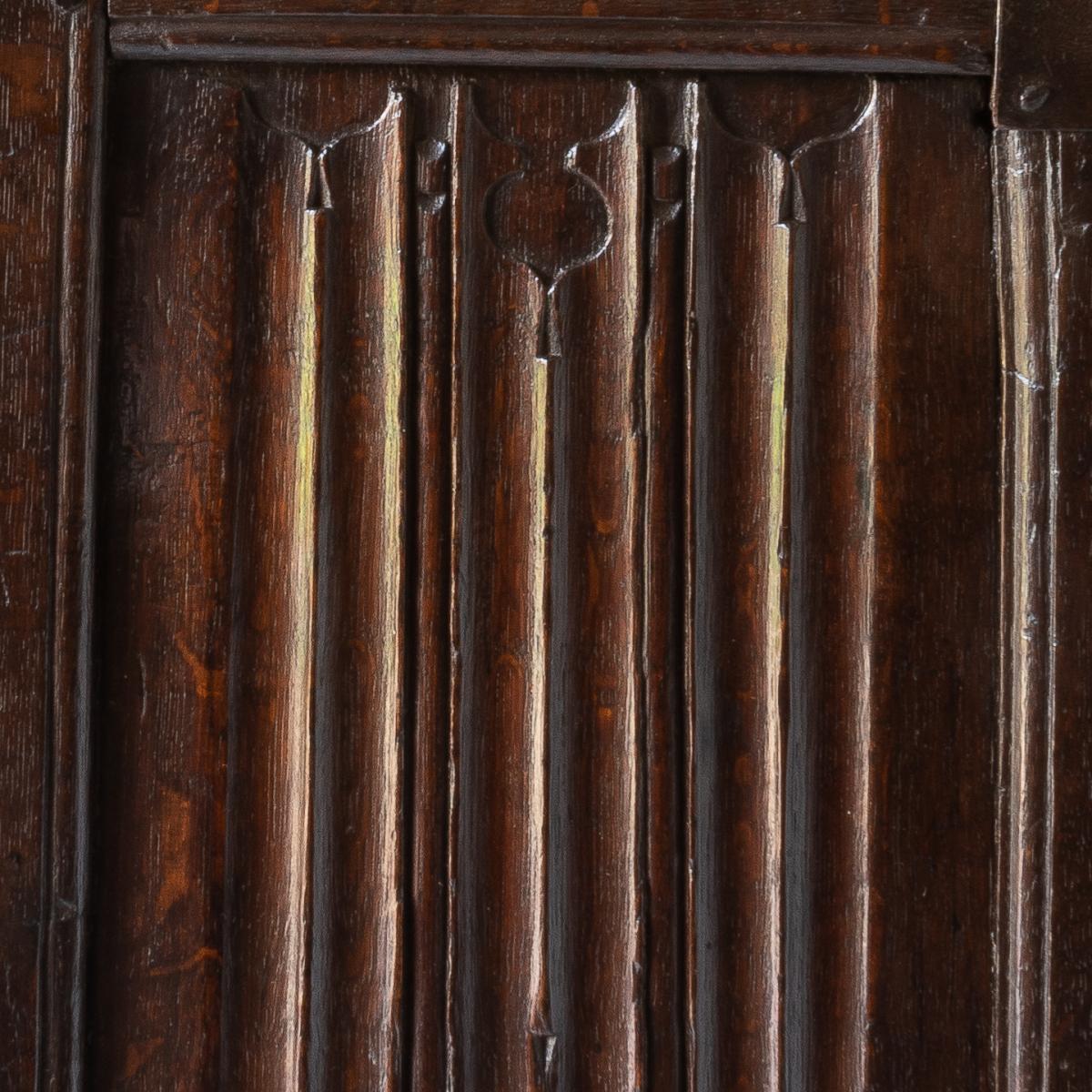 A particularly small Elizabeth I joined oak and linenfold-carved coffer, circa 1560