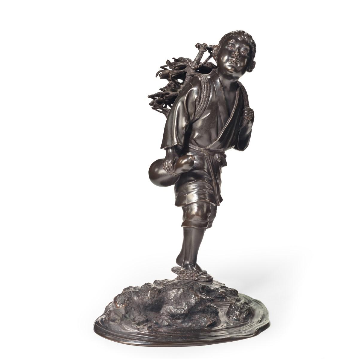 Meiji period bronze of a boy carrying twigs