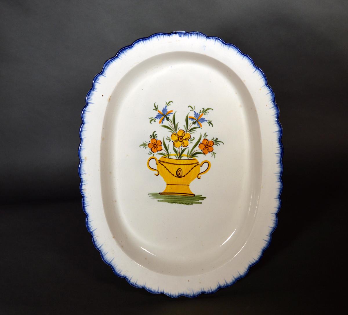 Shell-edge Prattware Oval Pearlware Dish painted with An Urn of Flowers