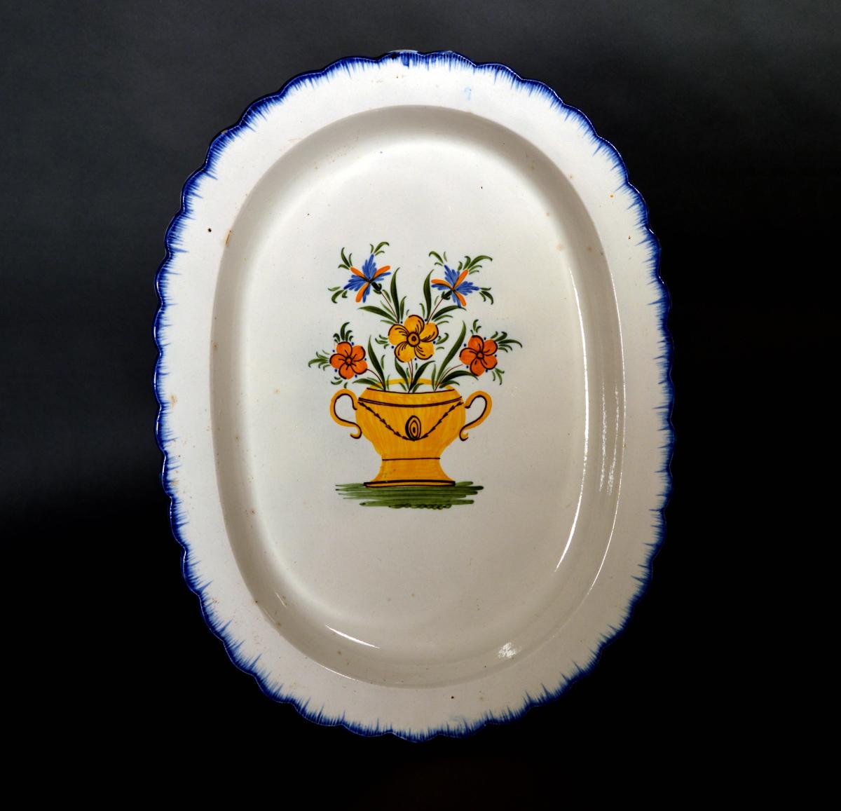 Shell-edge Prattware Oval Pearlware Dish painted with An Urn of Flowers