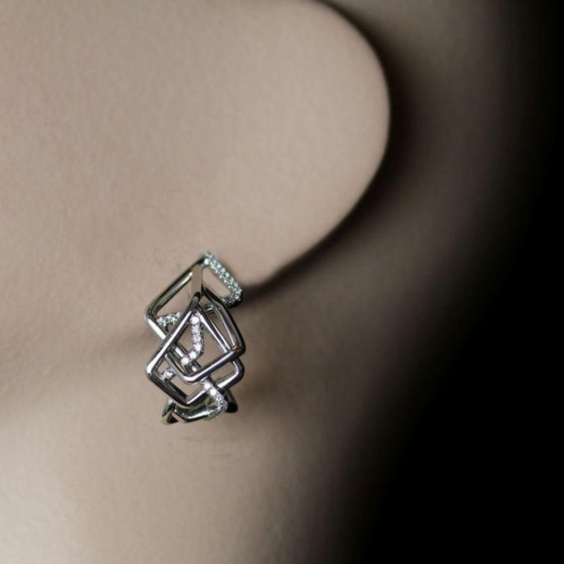 sculptural asymmetric platinum and diamond Disorient hoop earrings