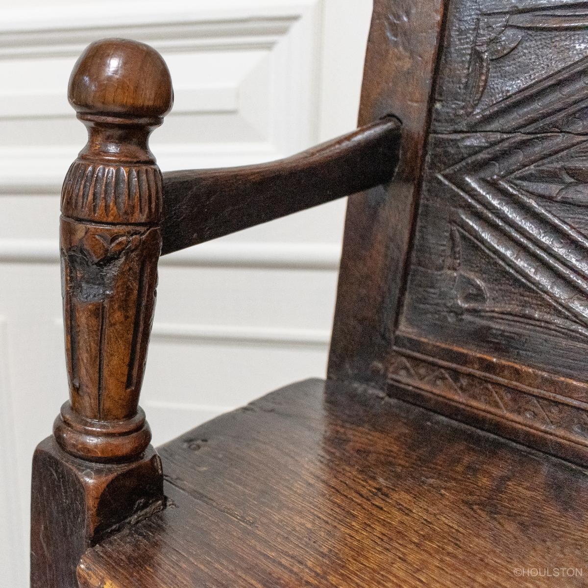 A 16th century English joined oak child's high chair 