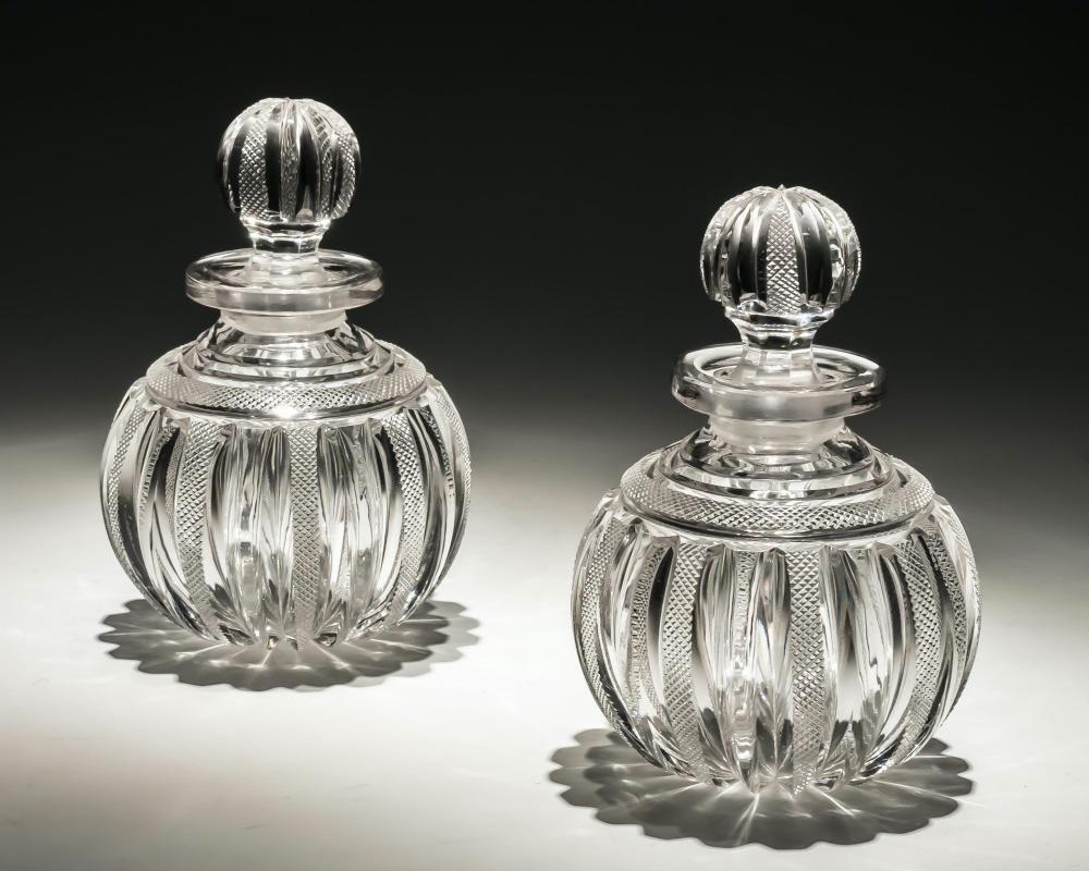 A fine pair of Regency pillar and file cut glass scent bottles.