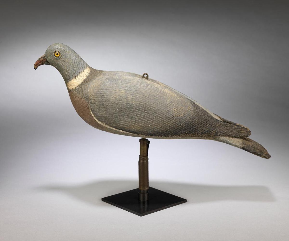 A Rare Documentary Working Wood Pigeon Decoy In Feeding Posture with Rocking Mechanism Various Media Clad in Hand Painted Canvas English, Lake District, c.1930 Stamped "DF" for Daniel Foster, Maker, and Former Gamekeeper at Cockermouth Castle.